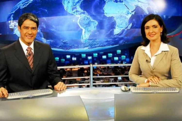 A Globo exibe conteúdo próprio em 82% do horário nobre, incluindo o Jornal Nacional, apresentado por William Borner e Fátima Bernardes, destaca a Moody's (João Miguel Júnior/Divulgação)
