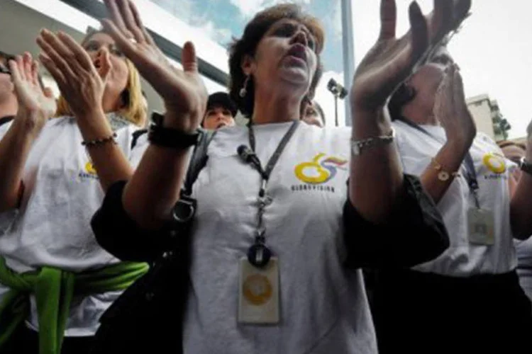 Jornalistas da Globovisión se manifestam contra o governo : a Globovisión já sofreu várias sanções administrativas e foi ameaçada de fechamento pelo governo (©AFP / Miguel Gutierrez)