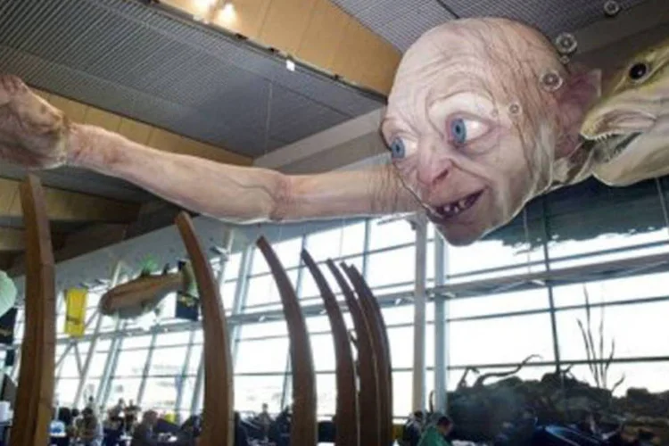 
	Uma representa&ccedil;&atilde;o gigante do Gollum, personagem de &quot;O Hobbit&quot;, &eacute; exibido no aeroporto de Wellington
 (Marty Melville/AFP)
