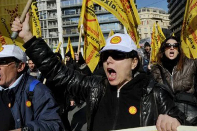 Protesto na Grécia: não vai adiantar nada xingar os Estados Unidos, a Alemanha, a União Europeia, o FMI... (Louisa Gouliamaki/AFP)