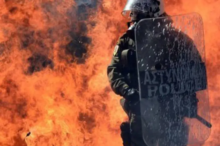 
	Recentemente ocorreram conflitos e protestos em Atenas devido &agrave; crise grega
 (Aris Messinis/AFP)