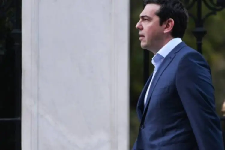 
	O primeiro-ministro grego, Alexis Tsipras, em Atenas: resgate projeta um d&eacute;ficit or&ccedil;ament&aacute;rio prim&aacute;rio antes do servi&ccedil;o da d&iacute;vida de 0,25 por cento este ano
 (Louisa Gouliamaki/AFP)
