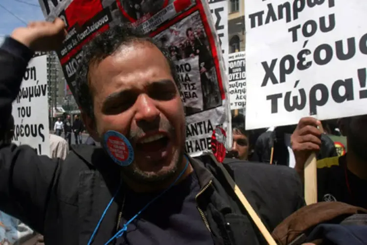 Funcionários de bancos também foram convocados à greve (Milos Bicanski/Getty Images)