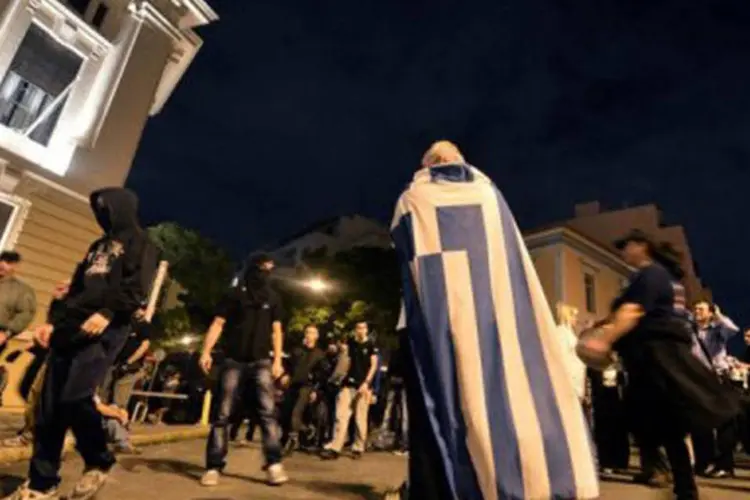 Jovens gregos protestam contra desemprego: o desemprego afeta 54,2% dos jovens entre 15 e 24 anos sem estudos e 31,4% na faixa de 25 a 34 anos (©AFP / Aris Messinis)