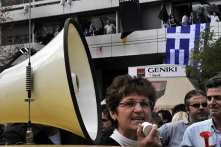 Os credores da Grécia, a União Europeia e o FMI, são muito impopulares entre os gregos por causa das medidas de austeridade dolorosas no país (Louisa Gouliamaki/AFP)