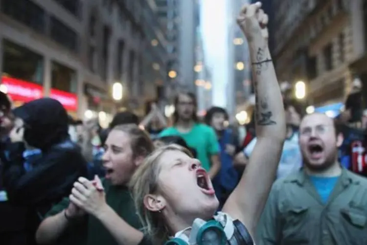 Os manifestantes comemoram a vitória contra a prefeitura e mantém a ocupaçãp (Spencer Platt/Getty Images)
