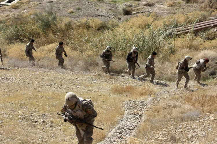 
	For&ccedil;as iraquianas fazem seguran&ccedil;a contra o Estado Isl&acirc;mico
 (Reuters)