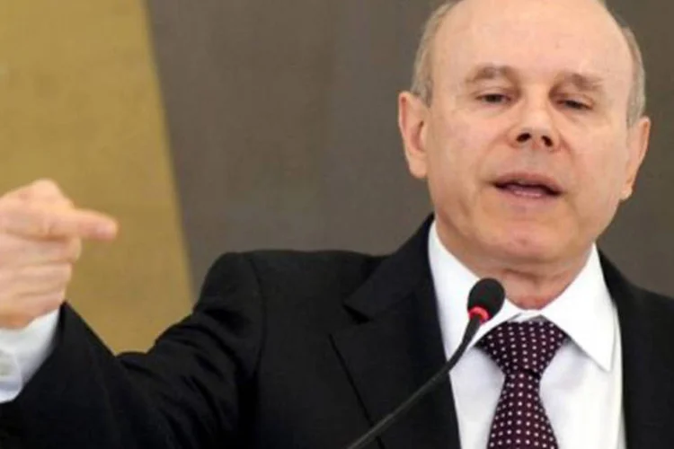 
	Guido Mantega: o ministro afirmou que no ano que vem o Pa&iacute;s voltar&aacute; a mostrar crescimento de produtividade maior do que a alta dos sal&aacute;rios, como era em 2010
 (Evaristo Sa/AFP)