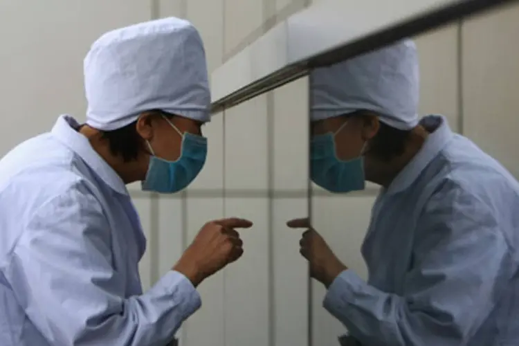 De acordo coma OMS, o vírus da gripe A (H1N1) não desapareceu mas já passou pela pior fase (Feng Li/Getty Images)
