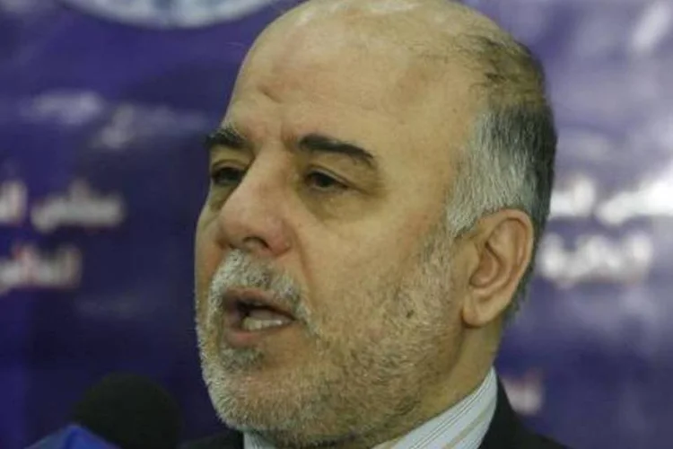 Haidar al-Abadi, o novo primeiro-ministro iraquiano, conversa com jornalistas em Bagdá (Sabah Arar/AFP)