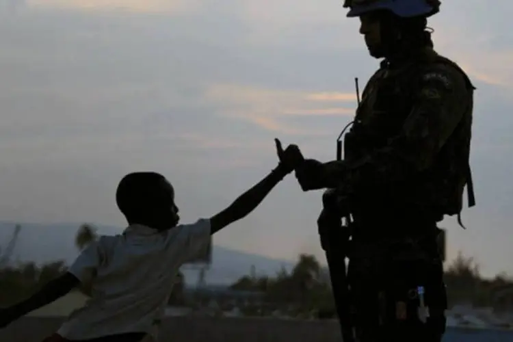 
	Em rela&ccedil;&atilde;o &agrave; retirada gradual das tropas estrangeiras da Minustah, Lamothe confirmou que deve ser obedecido o cronograma fixado at&eacute; 2016
 (AFP / Vanderlei Almeida)