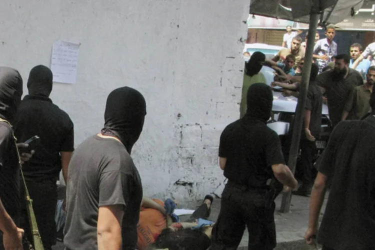 Militantes do Hamas: execução pública ocorreu em uma praça no centro da Cidade de Gaza nesta sexta-feira (Stringer/Reuters)