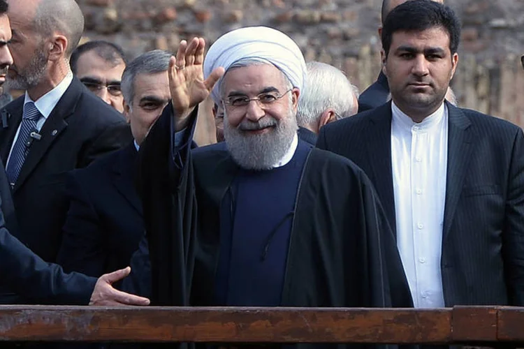 
	Hassan Rohani: &quot;N&atilde;o ser&aacute; o caso da economia se corrigir s&oacute; atrav&eacute;s da intera&ccedil;&atilde;o com o exterior. Isso &eacute; s&oacute; 40%&quot;
 (Filippo Monteforte / AFP)