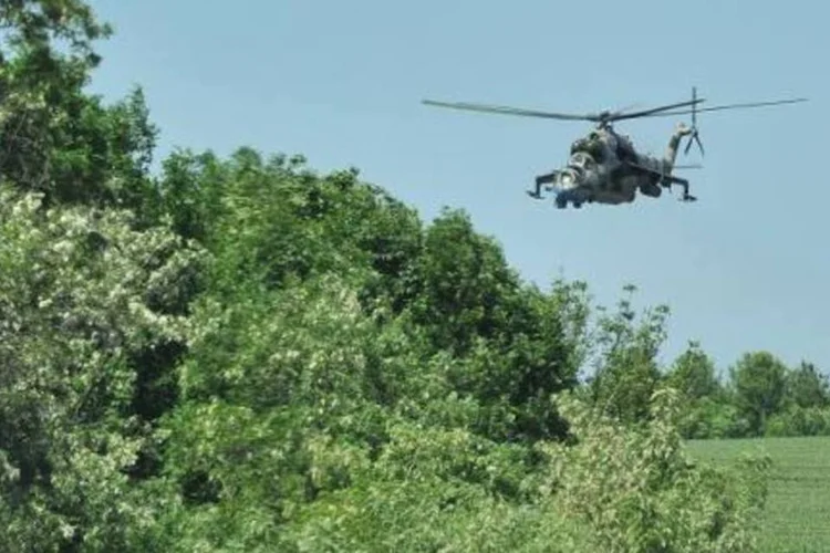 
	Helic&oacute;ptero militar ucraniano:&nbsp;grupo de milicianos atacou posto da guarda fronteiri&ccedil;a
 (Genya Savilov/AFP)