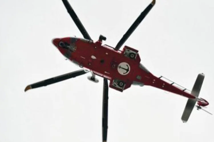 
	Helic&oacute;ptero da guarda-costeira: os cubanos que s&atilde;o interceptados no mar, mesmo a poucos metros da margem, devem ser repatriados
 (Andreas Solaro/AFP)