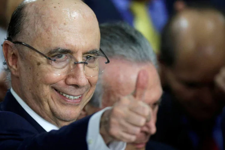 
	Henrique Meirelles: o substituto de Alexandre Tombini n&atilde;o ficou ao lado de Meirelles na entrevista porque ainda n&atilde;o havia chegado a Bras&iacute;lia
 (Ueslei Marcelino / Reuters)