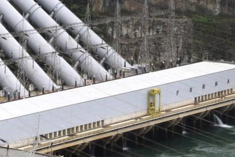 
	Vista da usina hidrel&eacute;trica de Furnas: companhia&nbsp;tem 49,9% do cons&oacute;rcio vencedor, enquanto o Fundo de Investimentos e Participa&ccedil;&otilde;es Constantinopla tem 50,1%
 (Paulo Whitaker/Reuters)