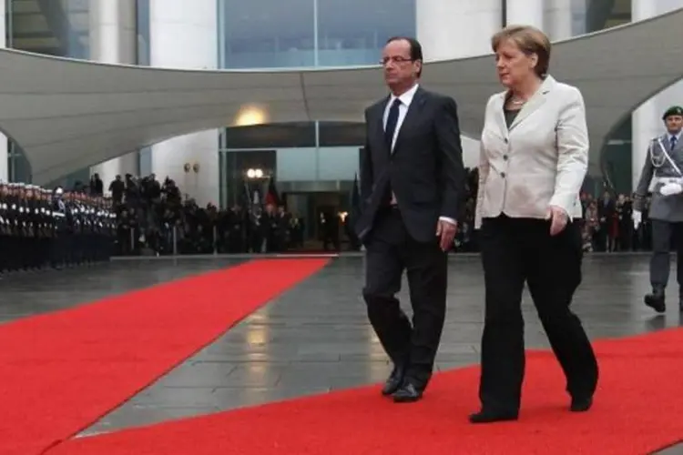 Merkel e Hollande: O presidente francês afirmou que a Europa deve ressaltar sua "coerência, força, unidade e solidariedade" (Sean Gallup/Getty Images)