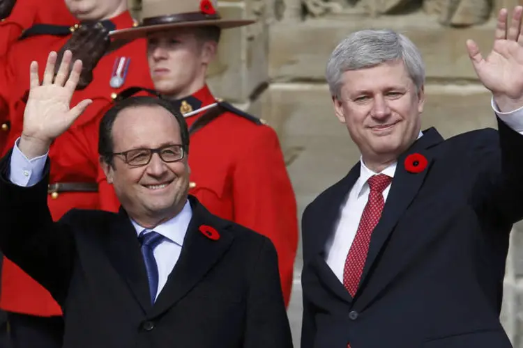 
	Hollande e Harper: esfor&ccedil;o militar regional, liderado pelo Iraque, ser&aacute; crucial, diz premi&ecirc; canadense
 (Chris Wattie/Reuters)