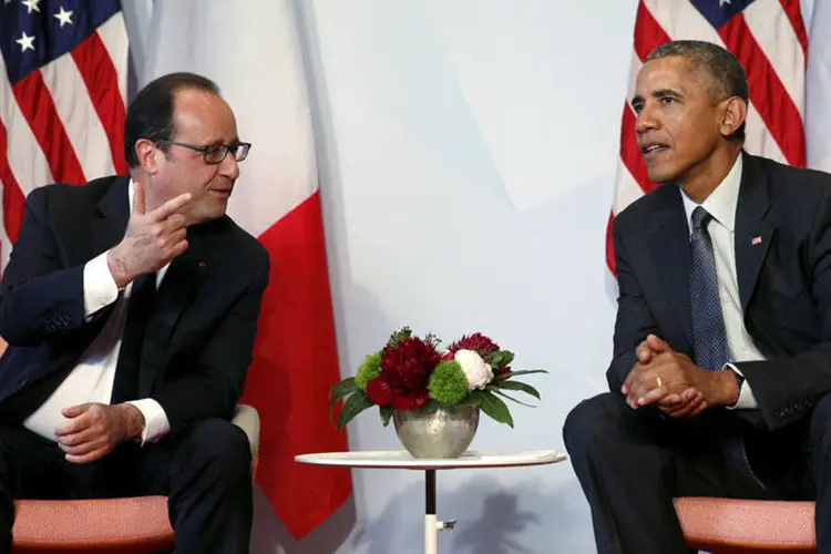 
	Fran&ccedil;ois Hollande e Obama: encontro servir&aacute; para abordar em detalhes a coopera&ccedil;&atilde;o bilateral contra o EI
 (REUTERS/Kevin Lamarque)