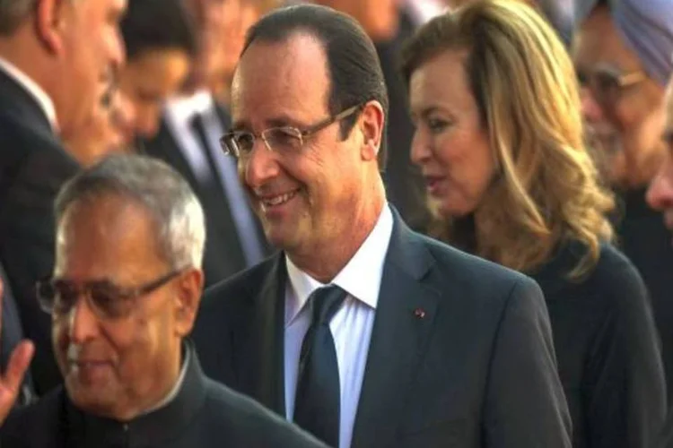 
	Fran&ccedil;ois Hollande: Hollande est&aacute; sob press&atilde;o na Fran&ccedil;a para abordar quest&otilde;es como a situa&ccedil;&atilde;o de Mikhail Khodorkovsky, que cumpre pena de 13 anos de pris&atilde;o por fraude e evas&atilde;o fiscal.
 (Getty Images)