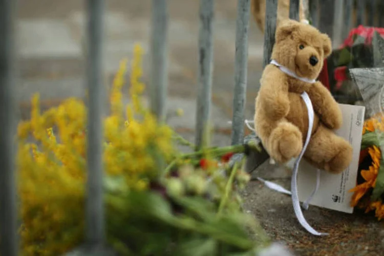 
	Homenagens &agrave;s v&iacute;timas do voo MH17: 26 especialistas holandeses e 11 australianos retornaram para Donetsk
 (Graham Denholm / Getty Images)