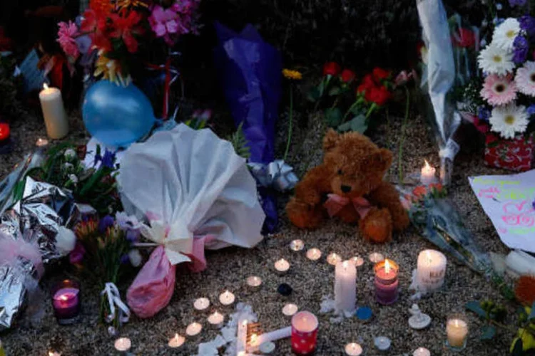 Velas e armas (Graham Denholm / Getty Images)