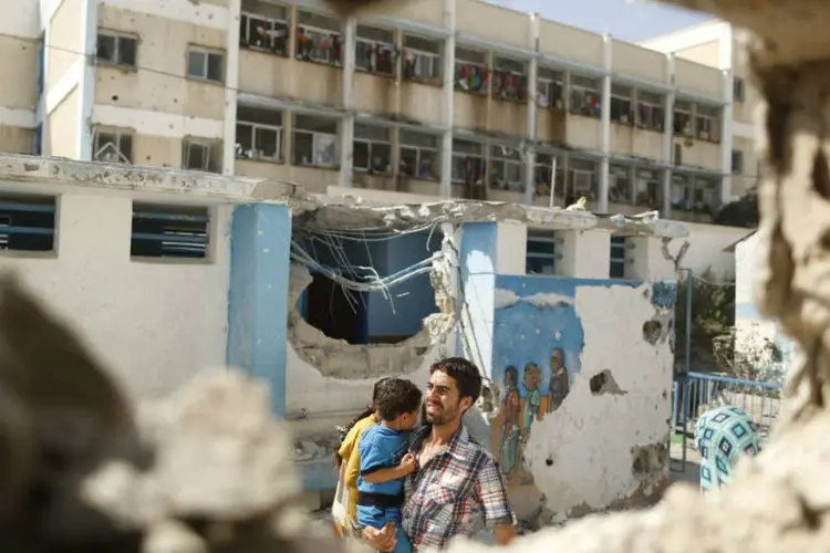 
	Escola destru&iacute;da em Gaza: inicialmente, a Casa Branca n&atilde;o responsabilizou nenhum dos lados
 (Suhaib Salem/Reuters)