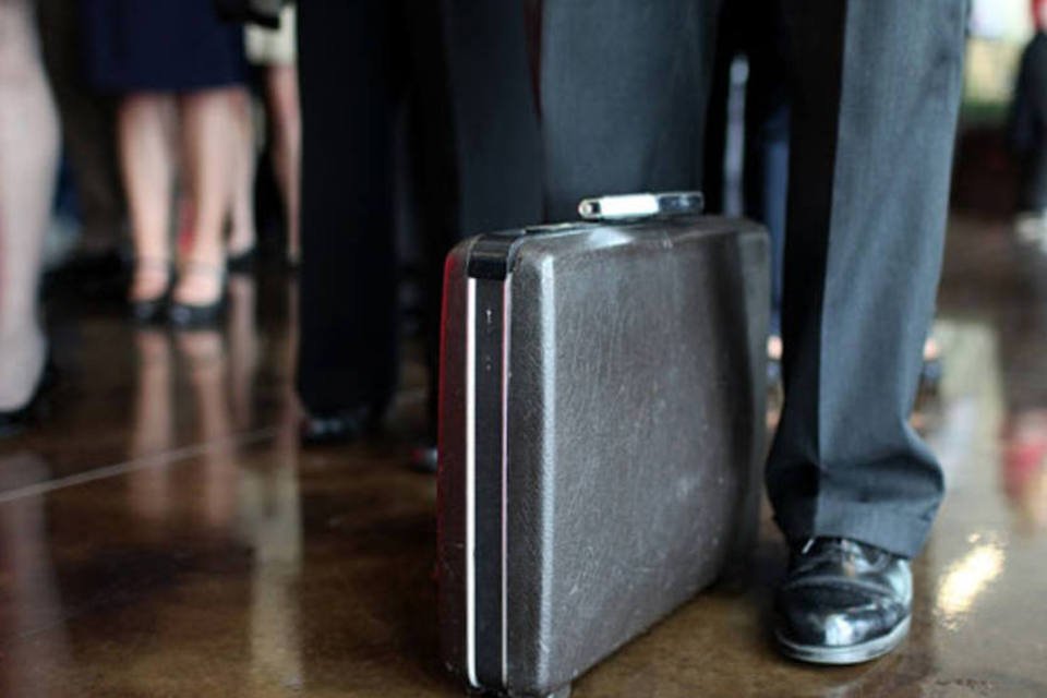 Homem com maleta (Getty Images)