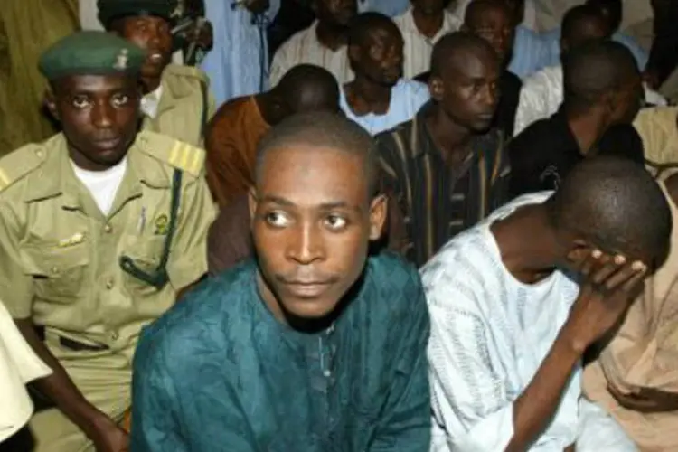 Homem acusado de "comportamento imoral", na Nigéria: lei da sharia prevê pena de morte para os homossexuais (Pius Utomi Ekpei/AFP)