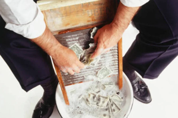 
	A lavagem &eacute; um processo que mira disfar&ccedil;ar a origem criminosa dos resultados do crime
 (Getty Images)