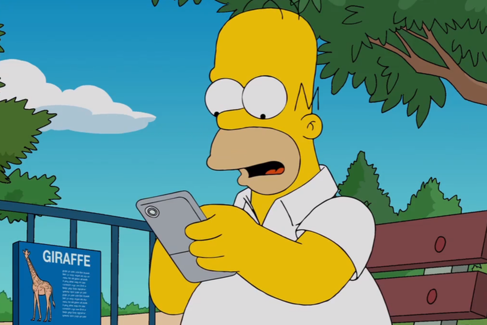 
	Homer Simpson: a cena tem um certo tom de ironia, uma vez que o personagem est&aacute; no zool&oacute;gico, mas prefere voltar sua aten&ccedil;&atilde;o aos animais do game
 (Reprodução/YouTube)