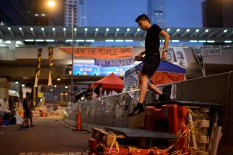 Ativista pró-democracia no distrito de Admiralty, em Hong Kong
 (Ed Jones/AFP)