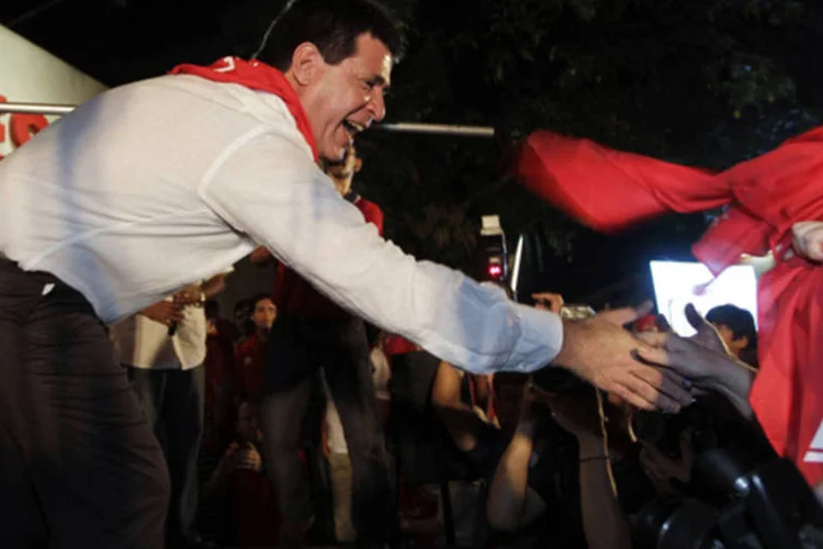 
	Hor&aacute;cio Cartes, de 56 anos, ganhou as prim&aacute;rias no domingo com apoio de cerca de 60% do seu partido
 (Jorge Adorno/Reuters)