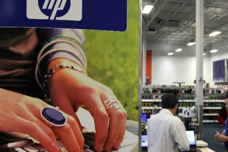 
	An&uacute;ncio para laptops HP &eacute; exibido em loja: companhia &eacute; a segunda maior fabricante de computadores pessoais do mundo
 (Justin Sullivan/Getty Image)