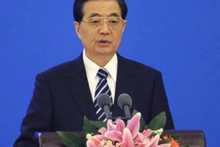 O presidente Hu Jintao inaugura a reunião de três dias que discutirá as prioridades do país para 2012
 (Liu Jin/AFP)