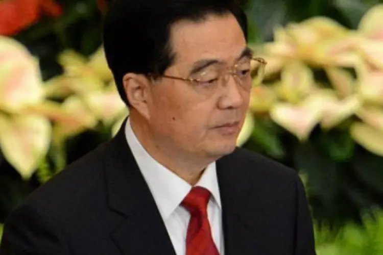 Hu Jintao: "Devemos dar mais importância a melhorar o sistema democrático com o objetivo de garantir que o povo possa ter eleições e decisões democráticas", afirmou o presidente ( AFP/Goh Chai Hin)