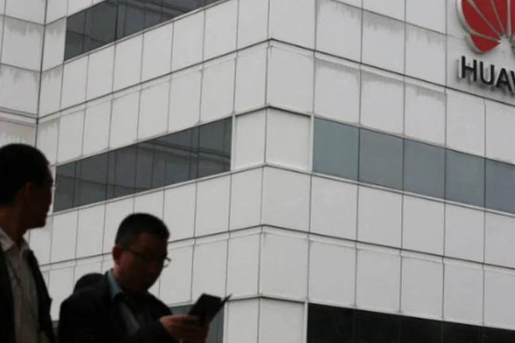 
	Huawei: companhia espera que a receita de seu neg&oacute;cio corporativo alcance 10 bilh&otilde;es de d&oacute;lares em cinco anos
 (AFP / Aaron Tam)