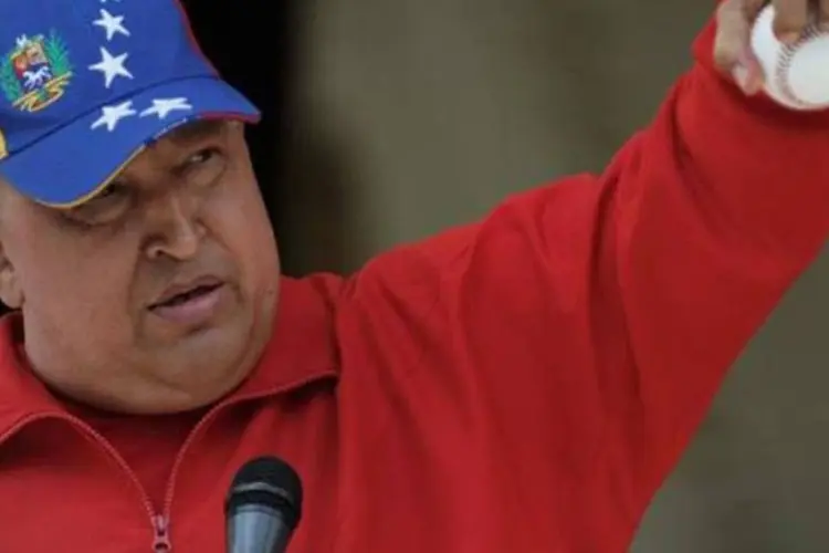Chávez: "Por mais tempo que eu viva, já tenho certeza de que não verei a Venezuela como a sonho, mas o que me importa. Ela será vista por meus filhos, minhas filhas, meus netos, minhas netas, será vista por vocês, rapazes, e vocês, moças" (Juan Barreto/AFP)