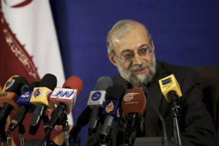 Chefe do Conselho de Direitos Humanos do Irã, Mohamed Javad Larijani, em coletiva de imprensa em Teerã
 (Behrouz Mehri/AFP)