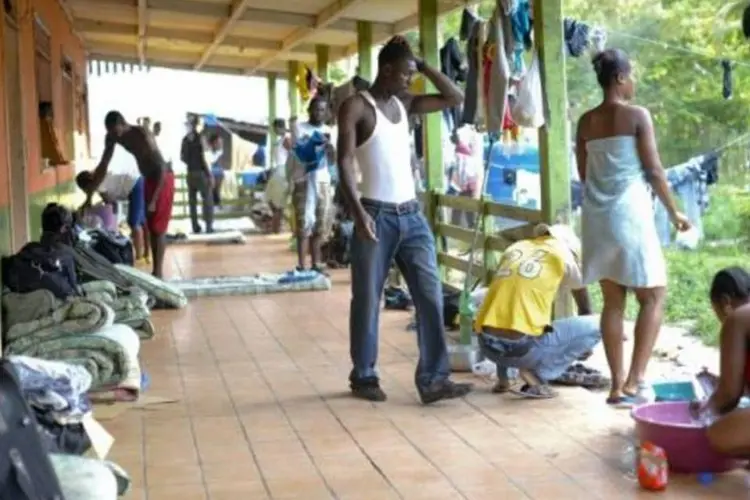 
	Haitianos imigrantes no Acre: os s&iacute;rios formam o maior contingente de refugiados no pa&iacute;s, com 2.077 pessoas, seguidos pelos angolanos
 (Marcello Casal Jr/Agência Brasil)
