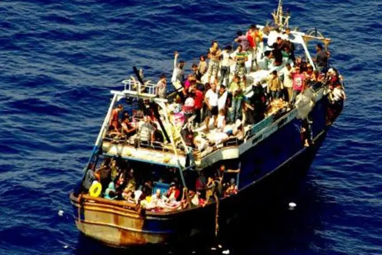 
	Imigrantes resgatados no Mediterr&acirc;neo
 (AFP)