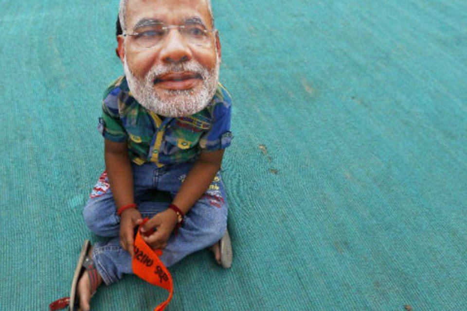 Seguidores de Modi comemoram sua vitória nas urnas