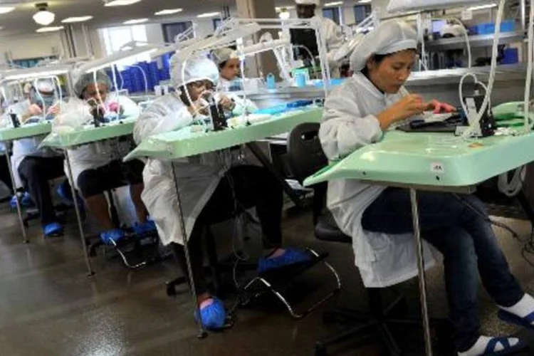 O aumento da atividade no setor industrial nos Estados Unidos desacelerou em março (Mira Oberman/AFP)
