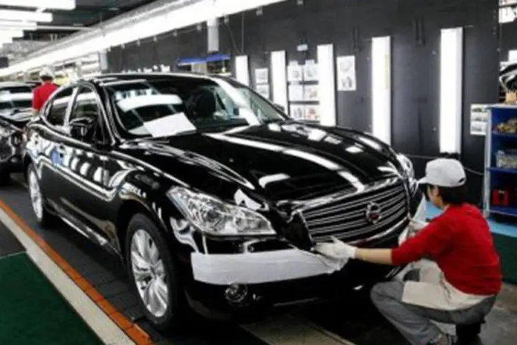 
	F&aacute;brica de autom&oacute;veis no Jap&atilde;o: a queda foi causada principalmente pelo setor automotor
 (Ken Shimizu/AFP)