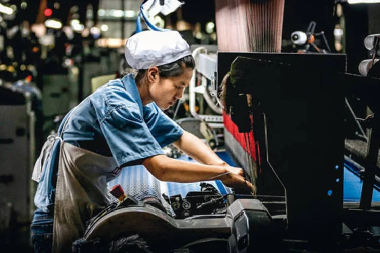 Fábrica em Shengzhou: operários chineses em setores de mão de obra intensiva somam 85 milhões (Feng Li/Getty Images)