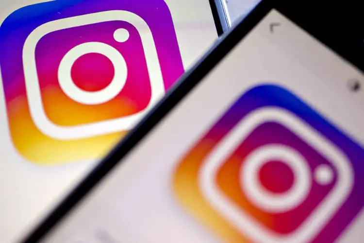 Logo do Instagram em dois smartphones (Andrew Harrer/Bloomberg)