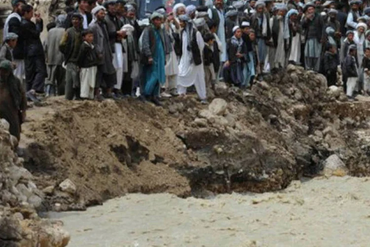 As inundações foram especialmente devastadoras nas aldeias de Shiraw e Mandrah, onde a água arrastou pelo menos 60 casas (Qais Usyan/AFP)