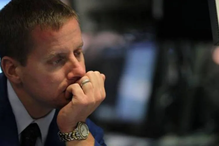 
	Como refer&ecirc;ncia, o &Iacute;ndice Bovespa, que re&uacute;ne os pap&eacute;is mais negociados no mercado brasileiro, caiu 27,64% em quatro anos
 (Getty Images/Spencer Platt)