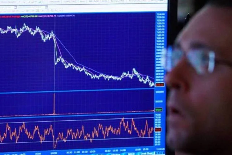 
	Mercado aguarda divulga&ccedil;&atilde;o de pesquisas eleitorais
 (Getty Images/Mario Tama/Staff)